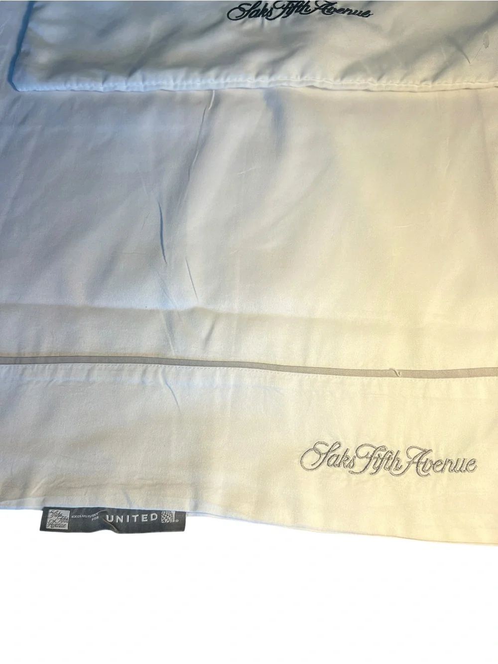 Saks Fifth Avenue White Embroidered Pillowcases by United Airlines